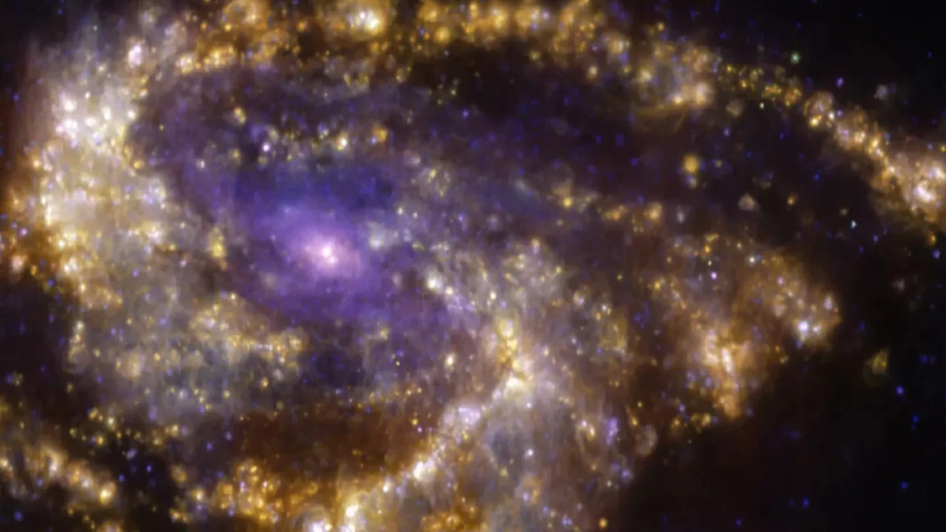 ESO Shares A Colourful Image Of NGC 3627 Galaxy Which Radiates Golden And Purple Gas