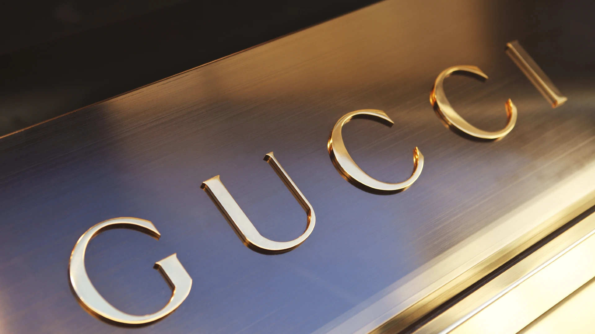 Who owns the Gucci brand now?